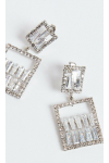 Kolczyki prostokątne w kolorze srebrnym wysadzane kryształkami