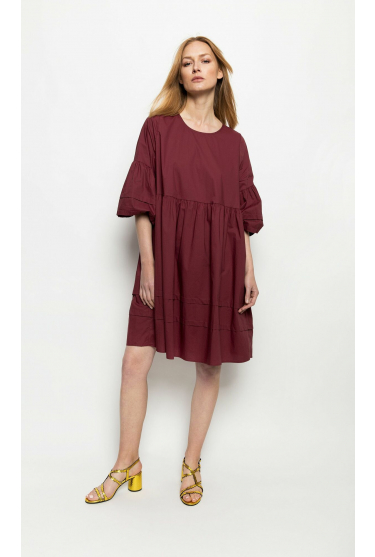 Borodowa, szeroka sukienka z bufiastymi rękawami